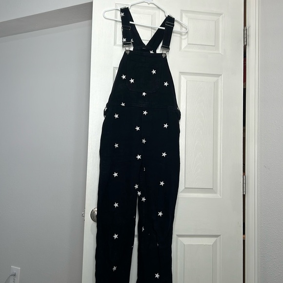 Storia Pants - Black overalls with white stars